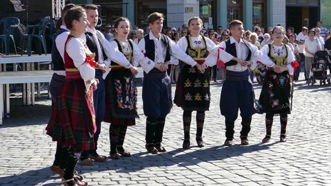 TIMISOARA , ROMANIA - MAY 12, 2018 : Young Serbian folk dancers perform at one local show organized by the City Hall in Union Square.