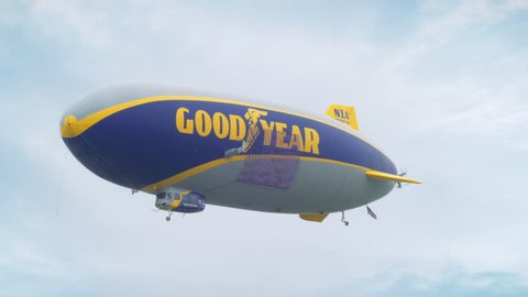 TAMPA, FL - MAY 12, 2018: Goodyear Blimp classic American airship flying overhead on May 12, 2018. 