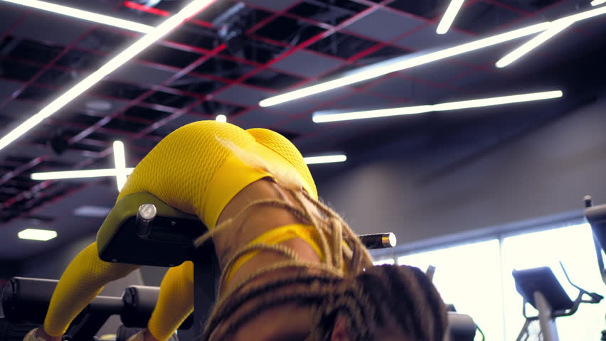 Girl with dreads doing hyperextension