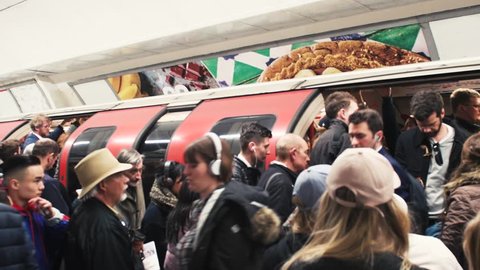 LONDON, UNITED KINGDOM - CIRCA 2018: London underground subway train station with crowd embark the train