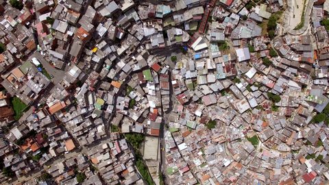 Medellin, Colombia, aerial top down view of Comuna 13 slums, once considered one of the most dangerous neighbourhoods in the world.