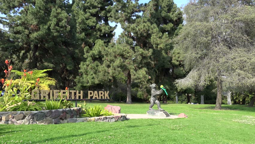 Griffith Park entrance sign with the bear cub statue. Los Angeles, California, USA