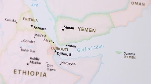 Yemen on a political map of the world. Video defocuses showing and hiding the map.
