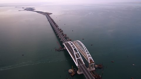 KERCH, RUSSIA, May 16, 2018: Aerial view of The Crimean Bridge, Kerch Bridge, colloquially the Kerch Strait Bridge with road and rail passages across the Kerch Strait, which will connect the Taman