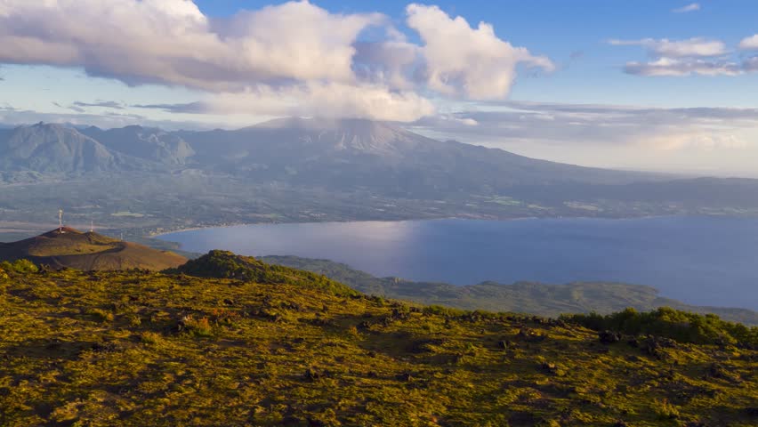 Aerial view on the heights of the Osorno volcano, with a view of the Calbuco volcano and Llanquihue lake, where you can also see a large part of Ensenada. South of Chile