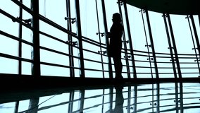 Business people walking around a light and modern open plan office building - Powered by Shutterstock - Get 15% off with code: PIKWIZARD15