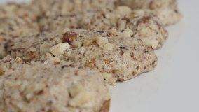 Orasnice walnut cookies on white 4K tilt footage