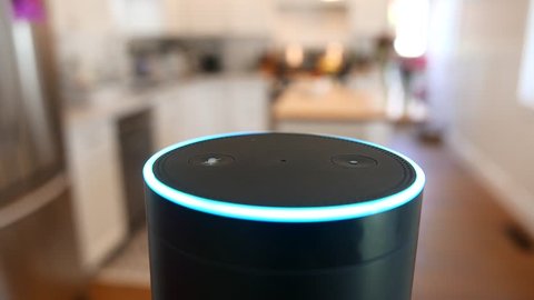 Amazon Alexa / Amazon Echo in Kitchen with blue light. For editorial use.