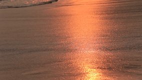 Video 1920x1080  Waves and sand on the beach during sunset, close up. Sri Lanka, Mirissa