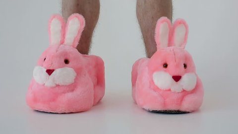 Slippers bunnies and men's feet