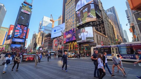 NEW YORK CITY - SEPTEMBER 2016: Timelapse of Times Square traffic and pedestrians at rush hour in New York City, USA.