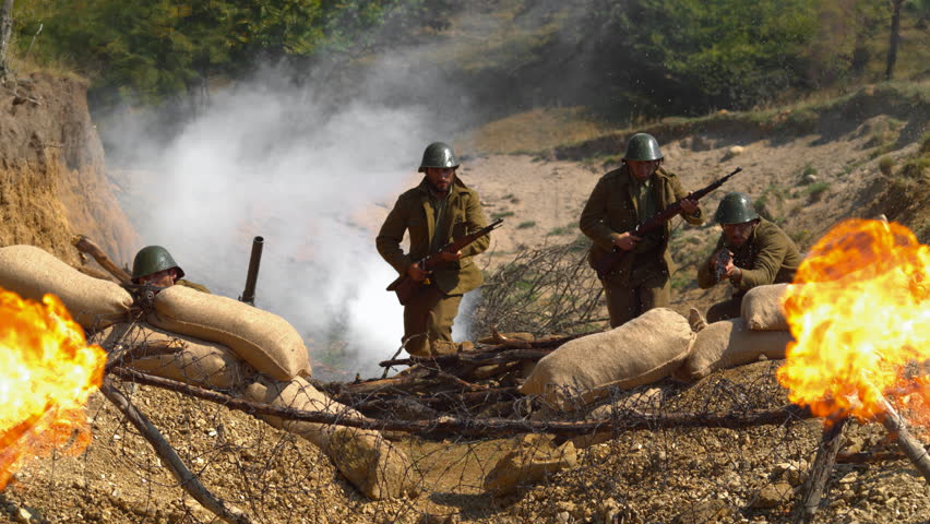 WW2 soldiers and explosions on the battlefield, slow motion