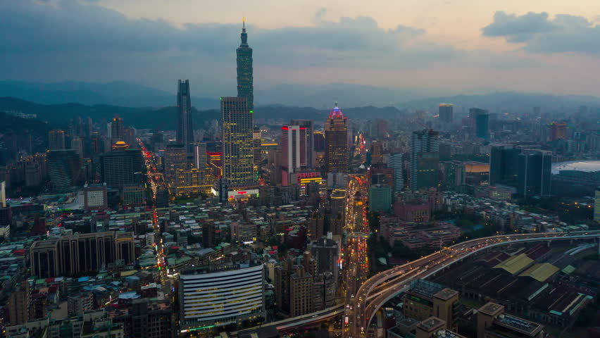 Sunset illumination taipei cityscape downtown traffic aerial panorama 4k timelapse taiwan