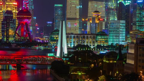 SHANGHAI, CHINA - SEPTEMBER 20 2017: night illumination shanghai pudong downtown bridge rooftop traffic river panorama 4k timelapse circa september 20 2017 shanghai, china.