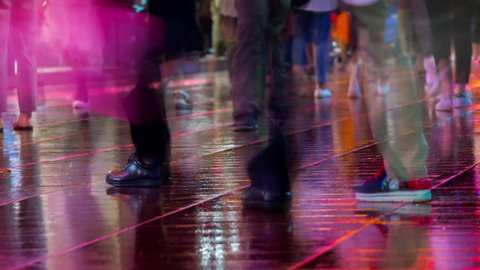 SHANGHAI, CHINA - SEPTEMBER 20 2017: night illuminated shanghai pedestrian street nanjing road wet floor panorama 4k timelapse circa september 20 2017 shanghai, china.
