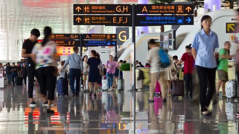 WUHAN, CHINA - SEPTEMBER 10 2017: wuhan city day time airport check-in zone crowded panorama 4k timelapse circa september 10 2017 wuhan, china.
