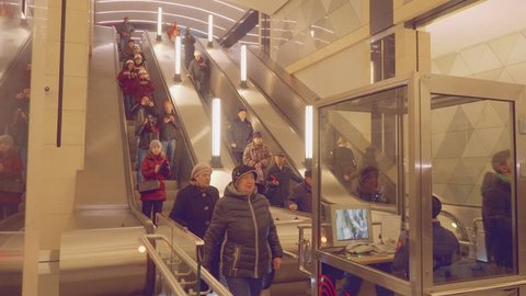 MOSCOW - CIRCA APRIL, 2018: View of people using escalator in new metro station