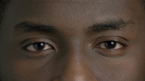 Afro-american man closed eyes close up. Face of black man close up.