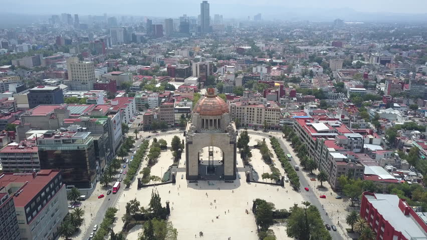 Aerial Drone of Mexico City's Dense Neighbourhoods and Monument to the Revolution(Monumento a la Revolución) Royalty-Free Stock Footage #1011230552