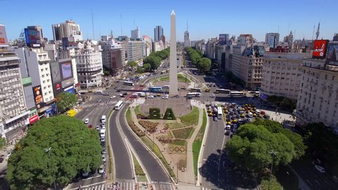 Buenos Aires, Argentina - January 9, 2018: Aerial view of the Obelisk of Buenos Aires and traffic on 9 de Julio Ave during daytime. 