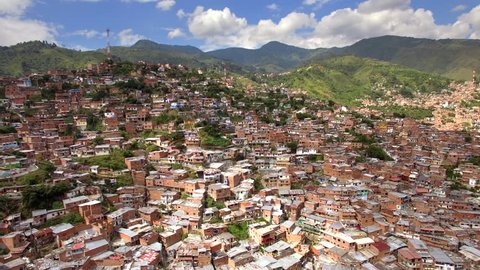 Medellin, Colombia, aerial view of Comuna 13 slums. Once one of the most dangerous neighbourhoods in Colombia, the Comuna 13 reinvented itself in recent times and is now considered safe to visit.