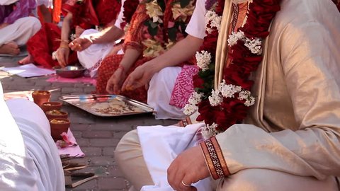 Indian weddings, newlywed. Newlyweds spend wedding custom. Fragment of wedding ceremony