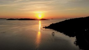 4K aerial sunset footage over the ocean shot from the drone at Coron bay, Palawan