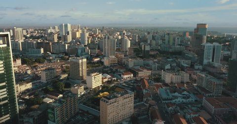 Aerial footage of Luanda's bay with sunset.