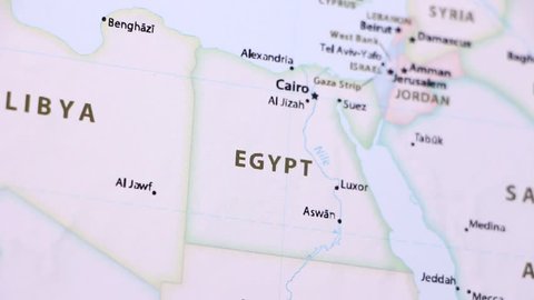 Egypt on a political map of the world. Video defocuses showing and hiding the map.