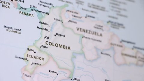 Colombia on a political map of the world. Video defocuses showing and hiding the map.