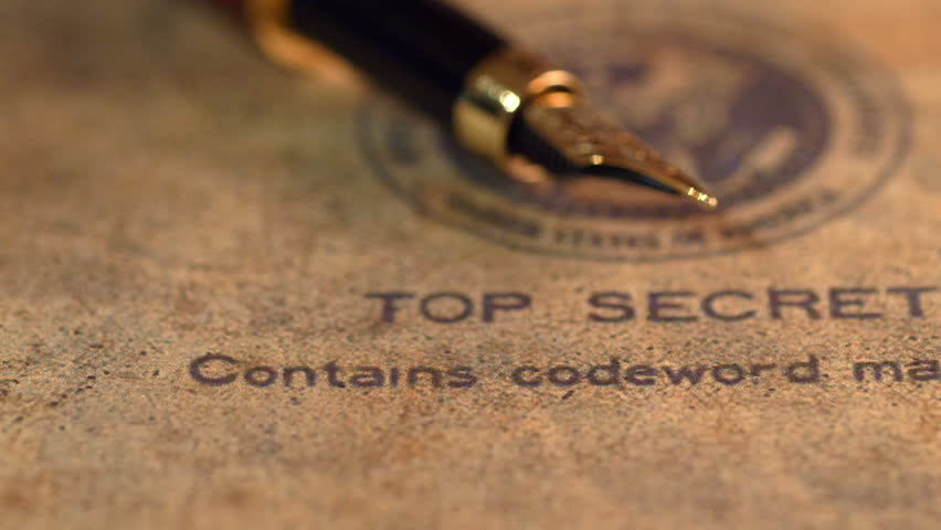 Fountain pen on top classified document