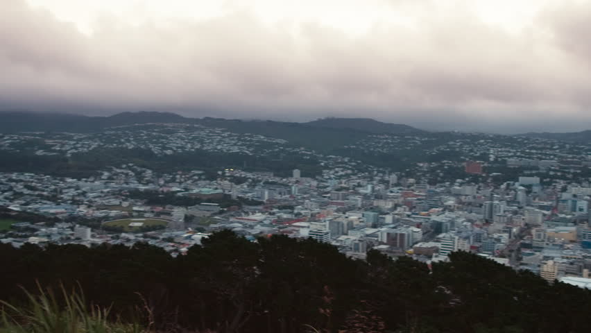Panning wide shot of Wellington city on a cloudy day at dusk