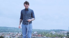 Magician performing trick with rope. Magic performer illusionist, disappears and rises. Cord artist. Cabaret show or circus entertainment performance. Animator. - Powered by Shutterstock - Get 15% off with code: PIKWIZARD15