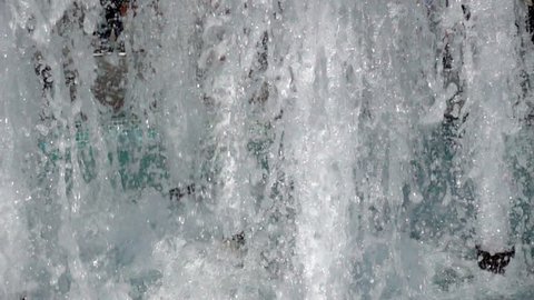 Slow Motion Splash of Foam and Water Splashing Fountain Close-Up.