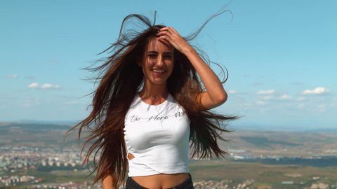 Wind blowing through a woman's hair