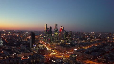 sunset sky moscow modern city traffic road ring junction aerial cityscape panorama 4k russia
