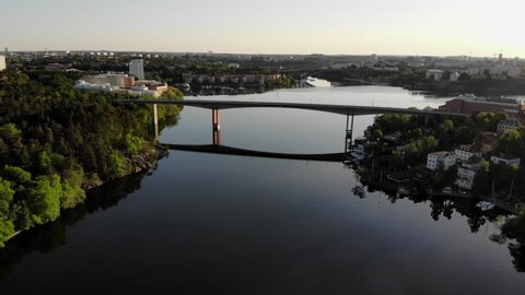 Aerial footage of the Stockholm island Stora Essingen and its tramway track bridge "Alviksbron"

