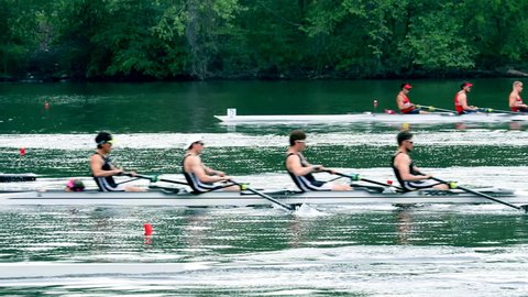 Philadelphia, PA / USA - 5/11/2018: Dad Vail Regatta, groups of four person oared rowing boat race over river