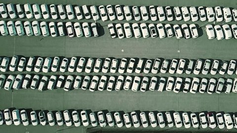 Aerial top down view of a car manufacturer warehouse