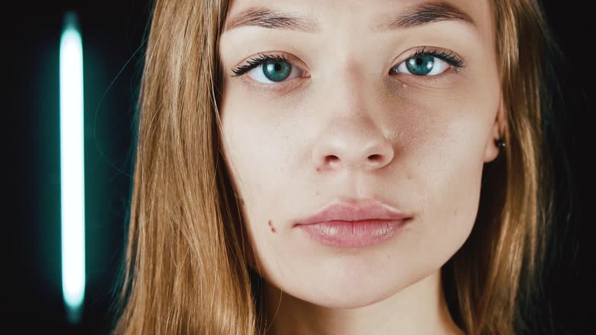 Diet. The girl grows thin. The concept of losing weight. Mouth to lock. Slow Motion.