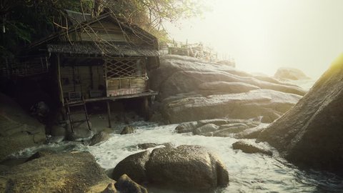 Authentic Hut Build on an Ocean Shore with Jungle in Background. Shot on RED Epic 4K UHD Camera.
