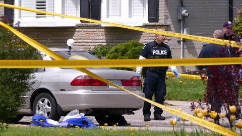 Toronto, Ontario, Canada May 2018 Police homicide officers at shooting murder scene