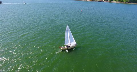Aerial shot of yacht sailing on lagoon. Sailing boat. Yacht from drone. Yachting video. Yacht from above. Sailboat from drone. Sailing video - 16