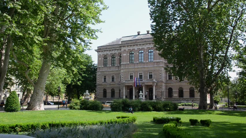 Park Zrinjevac in downtown Zagreb in spring. Fountain in green park. Zagreb is the capital and the largest city of Croatia.