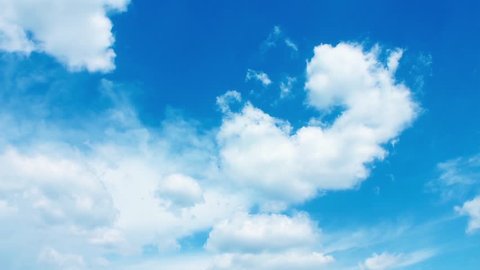 Seamless Loop Clouds, Beautiful white clouds soar across the screen in time lapse fashion over a deep blue background. Blue Sky, Flight over clouds, loop-able, cloudscape, day. FHD.