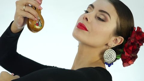 Close-up flamenco dancer on a light background. slow motion