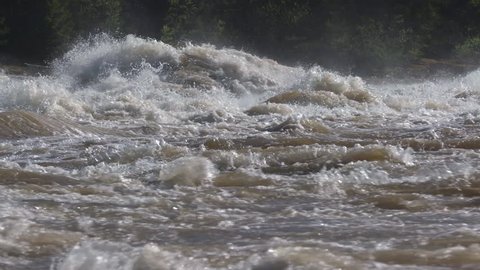 very strong raging river, slow motion