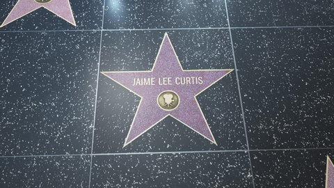 Hollywood, CA, USA - 05/15/18: Hollywood Walk of Fame Star with Jaime Lee Curtis' name. Wide and Close-up Detail. For editorial purposes. Commercial use requires approval.