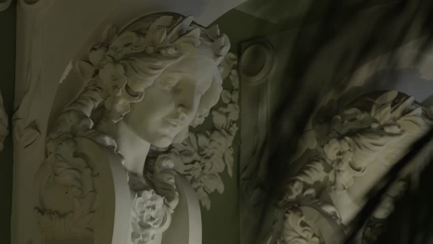 Close up 4K view on caryatid in niche with tropical plant, a Buildings & Landmark Video by tamazzzi