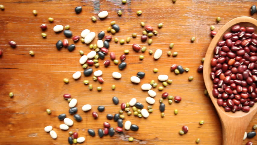 Beans - Pile of beans and Red Azuki, Black bean on the wooden spoon whit wooden background for natural grains consisted. Closeup, Top view